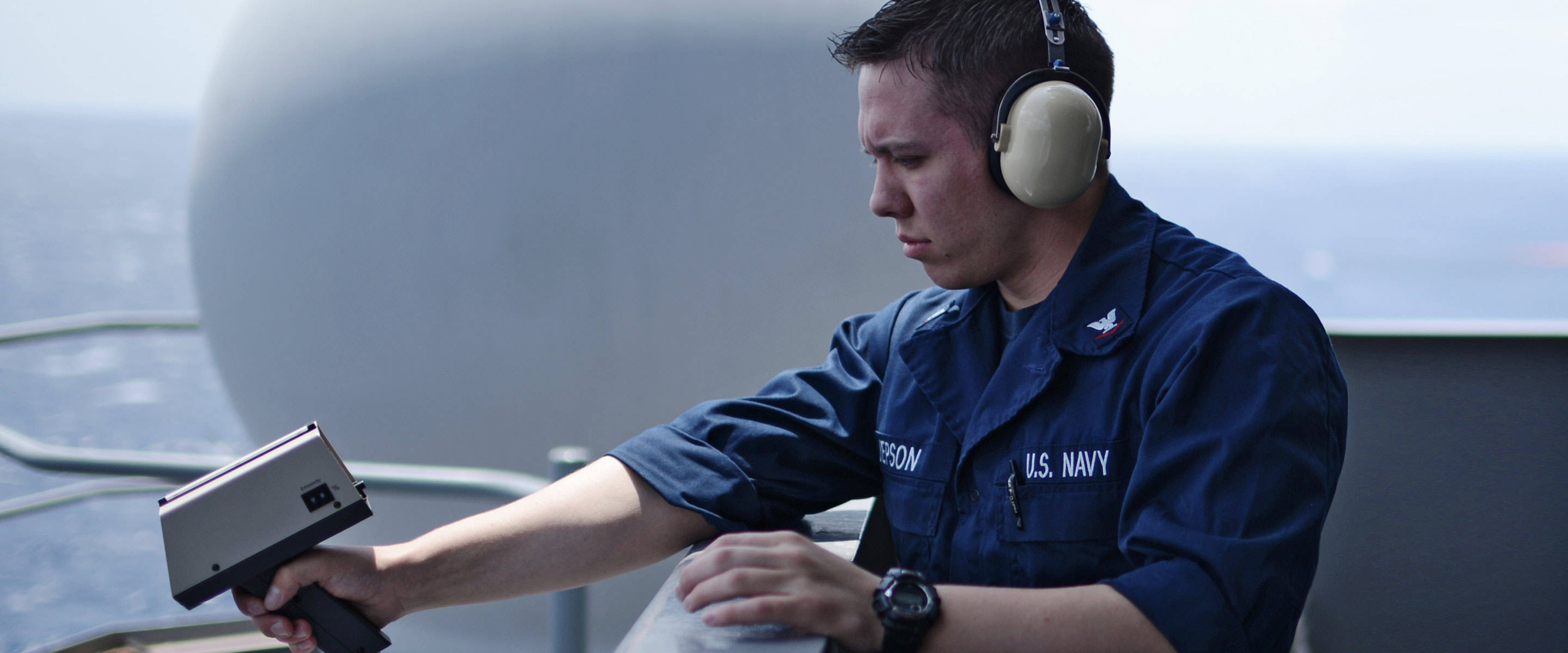Navy Aerographer's Mate monitors sea conditions aboard a Navy ship