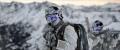 hero-careers-navy-seals-low.jpg A team of United States Navy Seals in full gear works together during a spec ops training session.