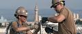 hero-careers-construction-officer-or-civil-engineer-corps-low.jpg Two current Navy Civil Engineers repairing a fence