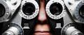 hero-careers-optometry-low.jpg A United States Navy Optometrist uses an ophthalmoscope tool to examine a patient's eyesight.