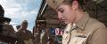 United States Navy Reactors Engineer celebrate after receiving her submarine officer warfare insignia at Naval Submarine Base Kings Bay.